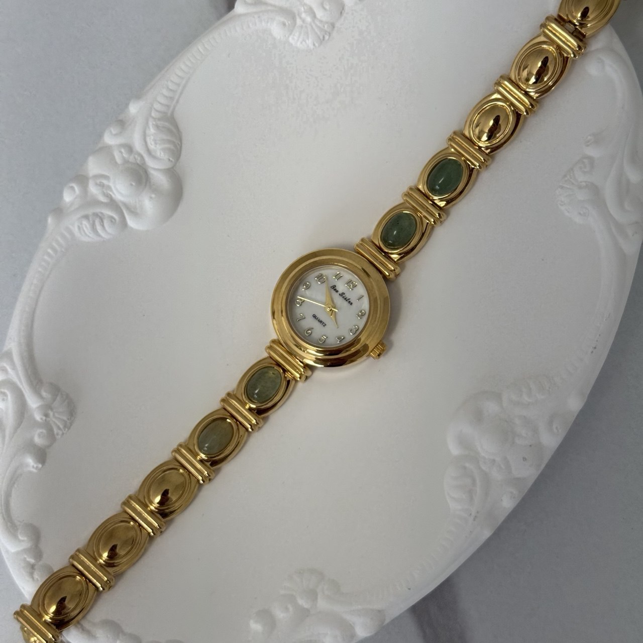 Gold Mini Watch Bracelet With Green Stones