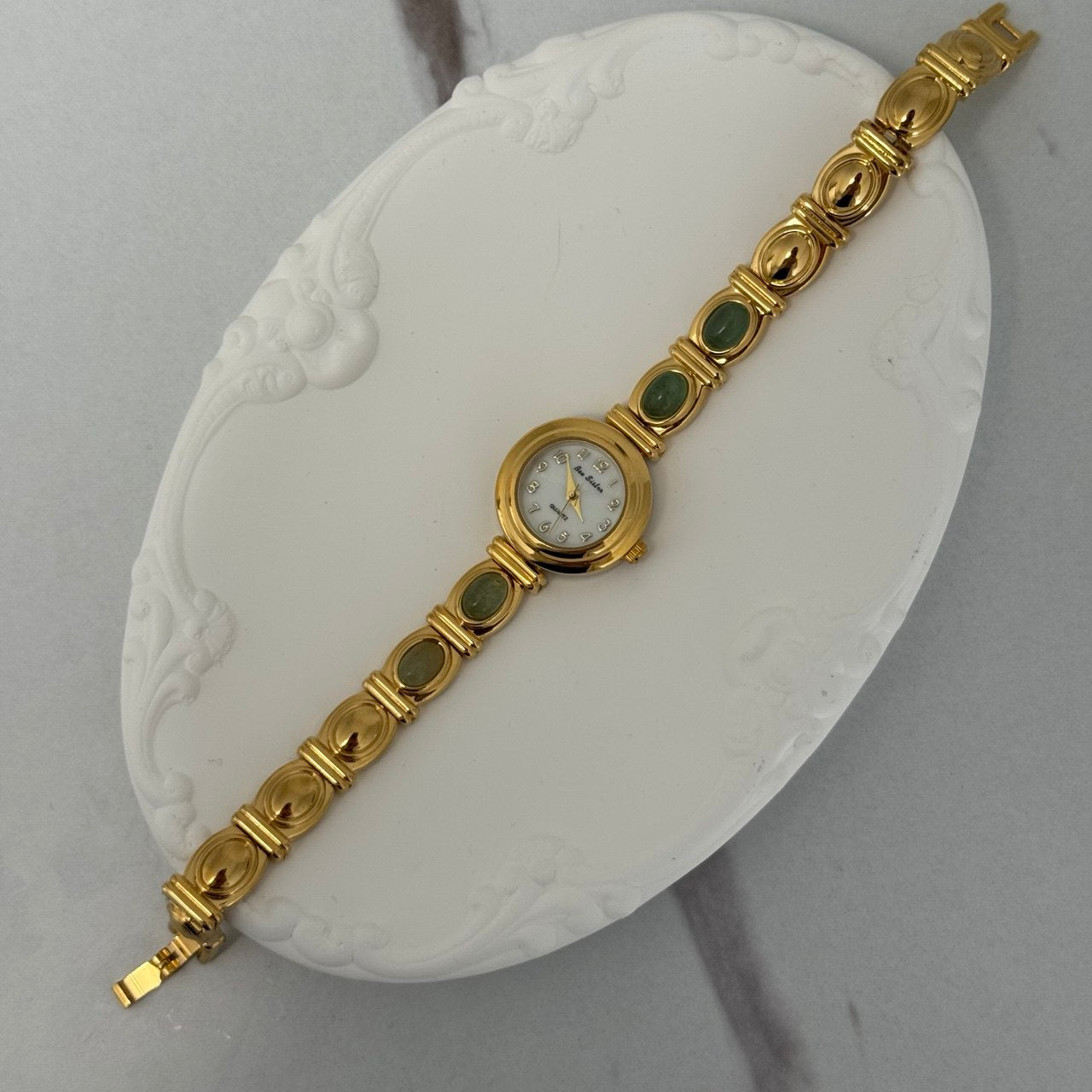 Gold Mini Watch Bracelet With Green Stones