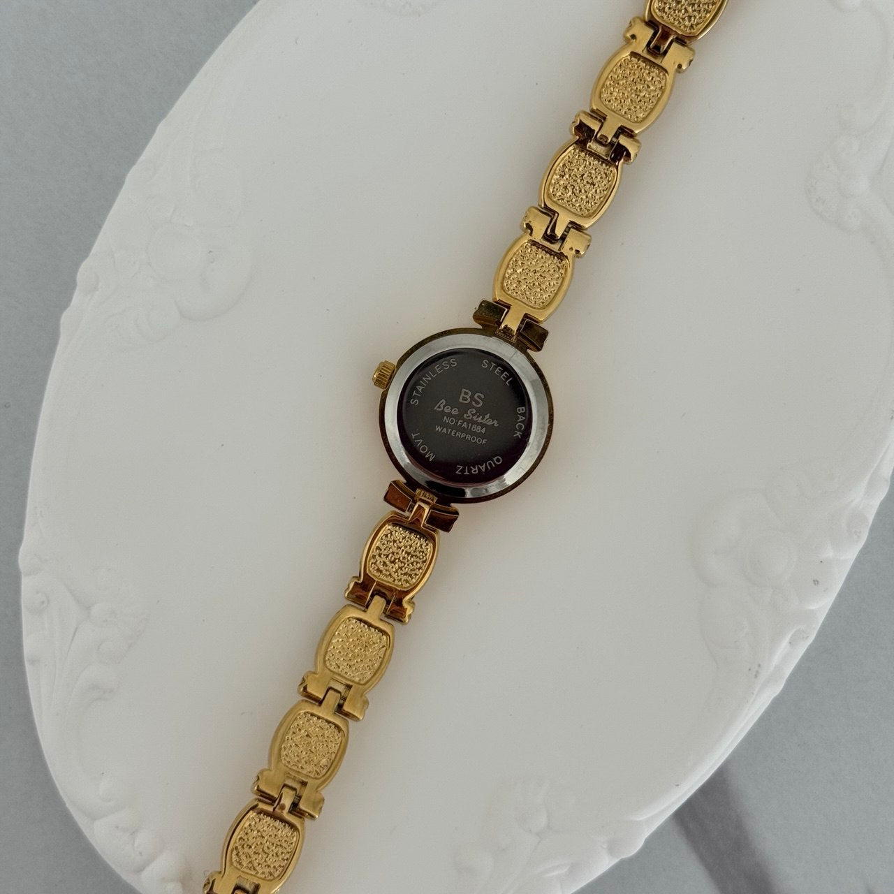 Gold Mini Watch Bracelet With Green Stones