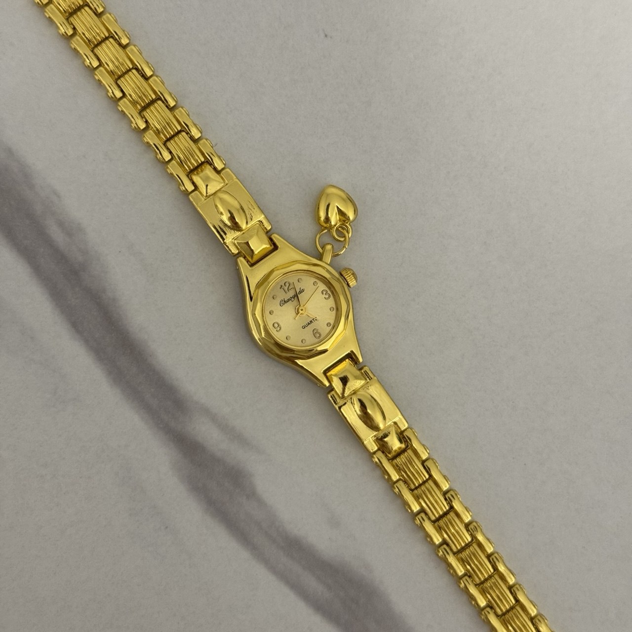 Vintage vibe gold mini watch