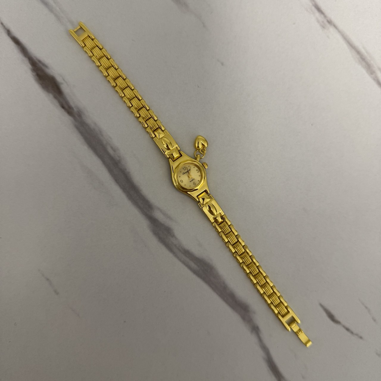 Vintage vibe gold mini watch