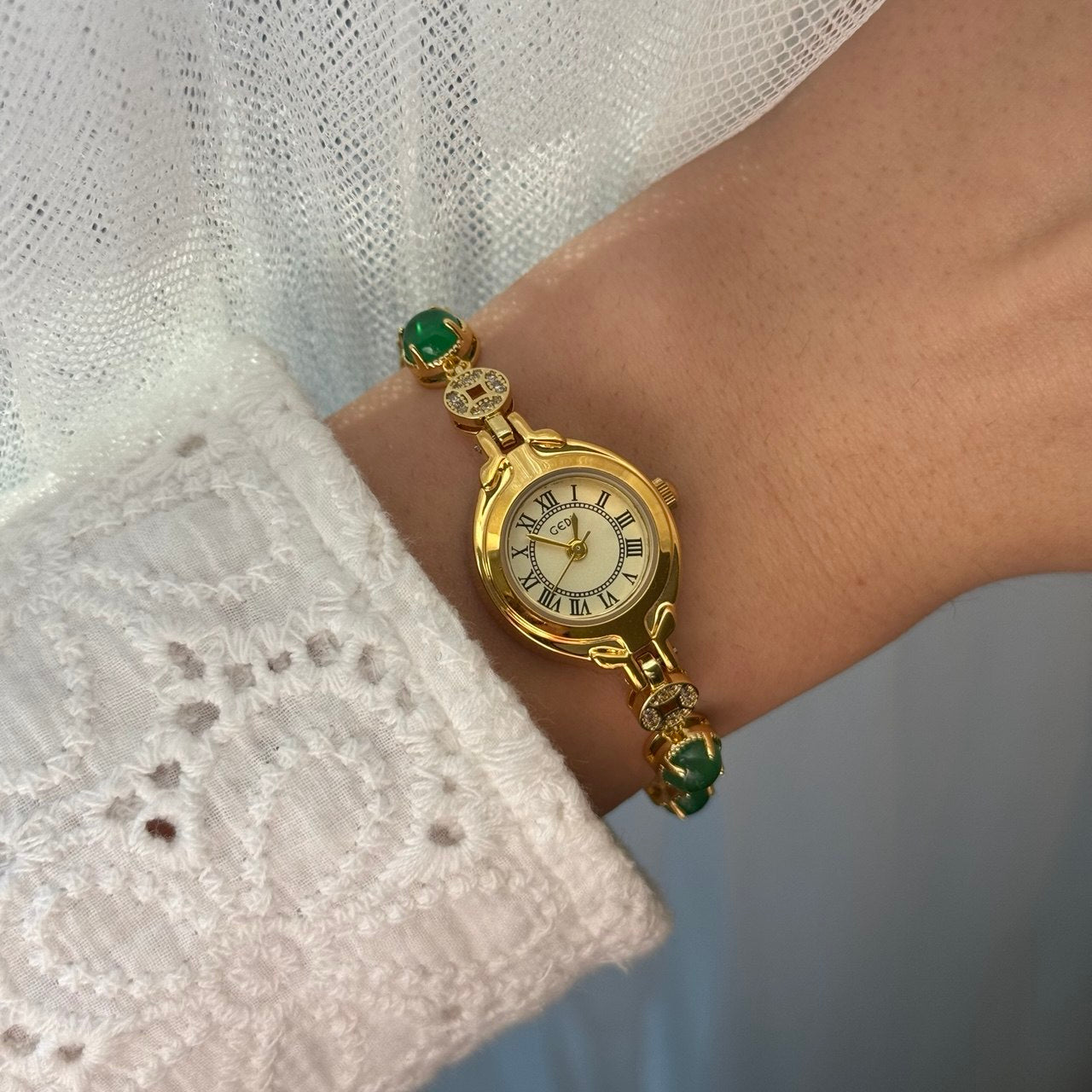Gold Watch Green Zircon Stone