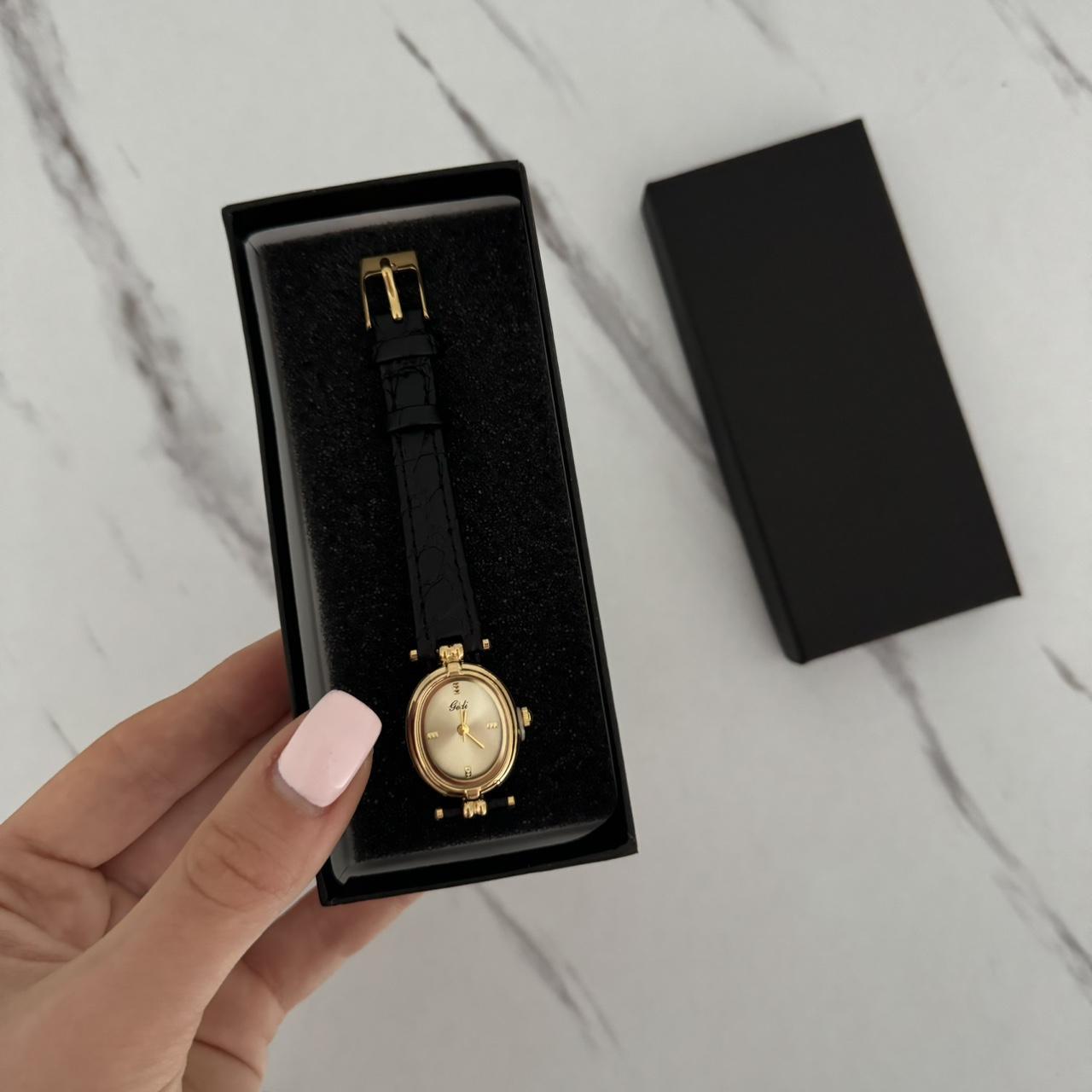 Oval Black/Gold Watch