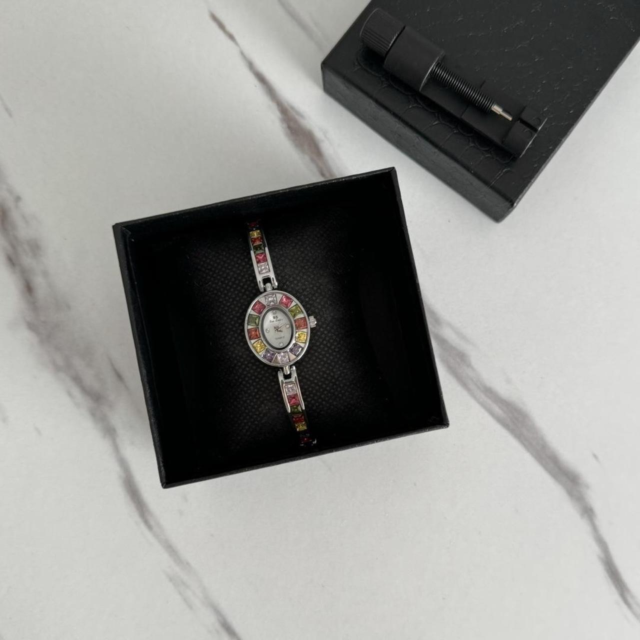Watch multicoloured zircon stone