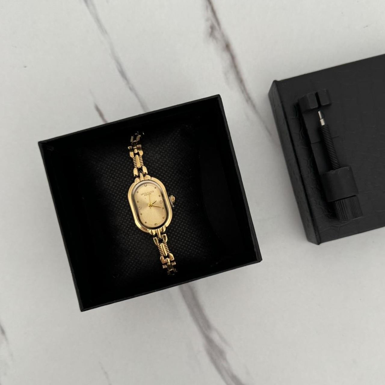 Gold mini watch PARIS