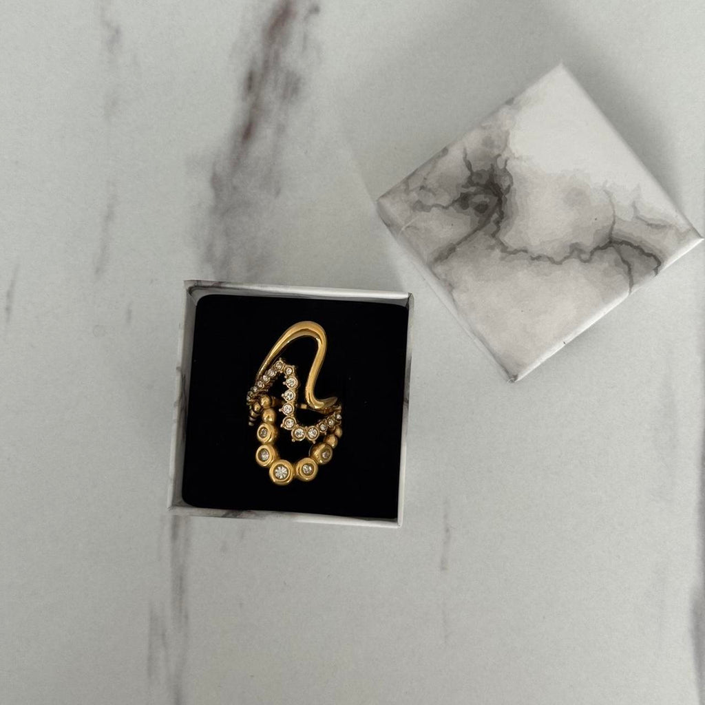 Gold ring with zircon stone