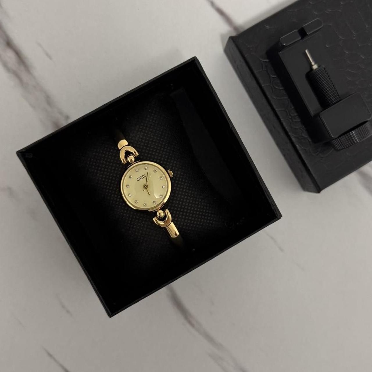 Round Gold Watch