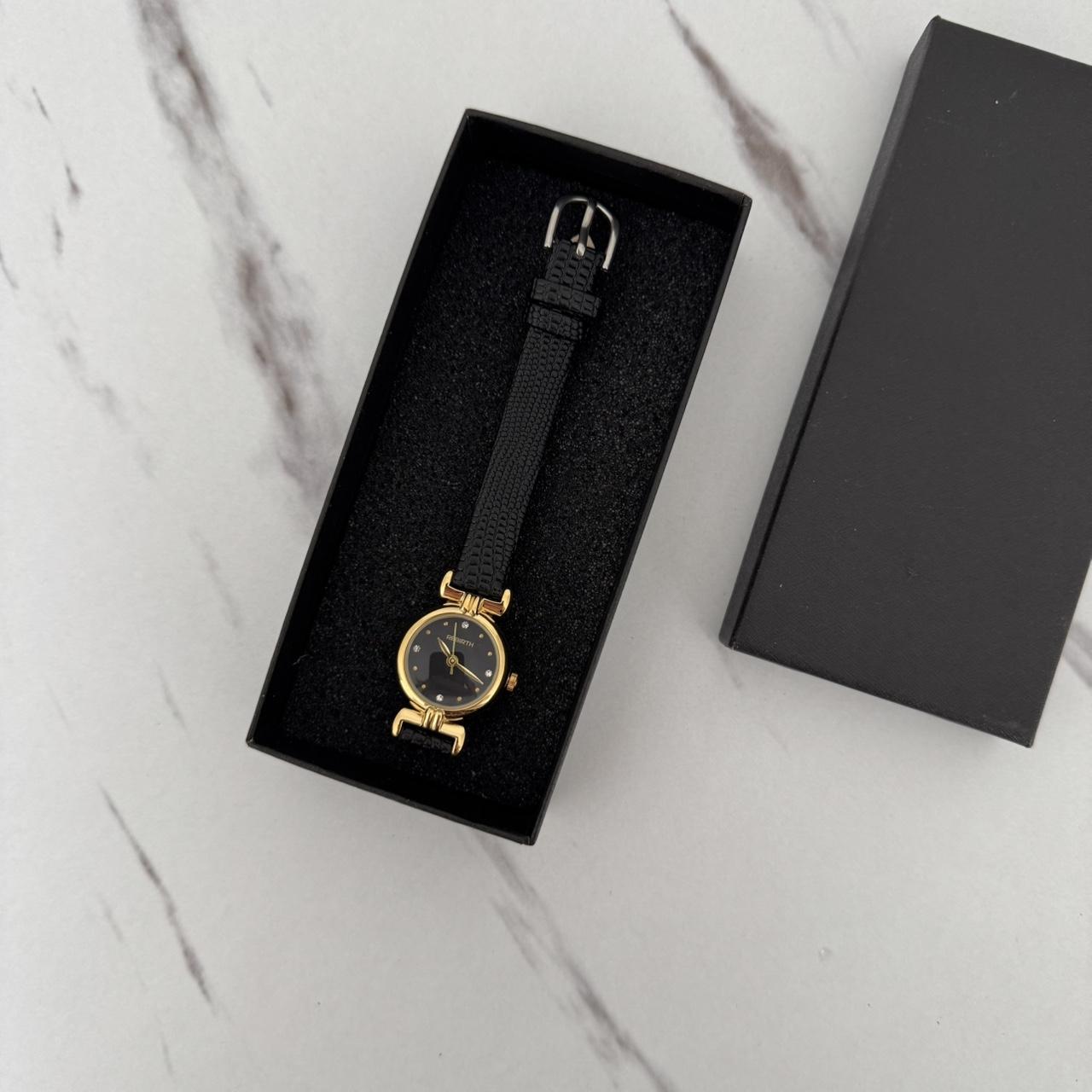 Women's Black and Gold Watch