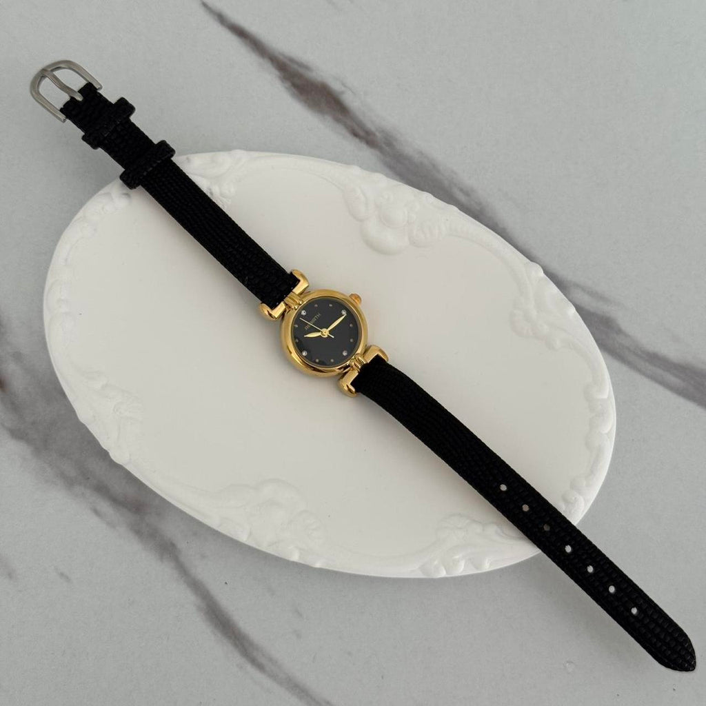 Women's Black and Gold Watch