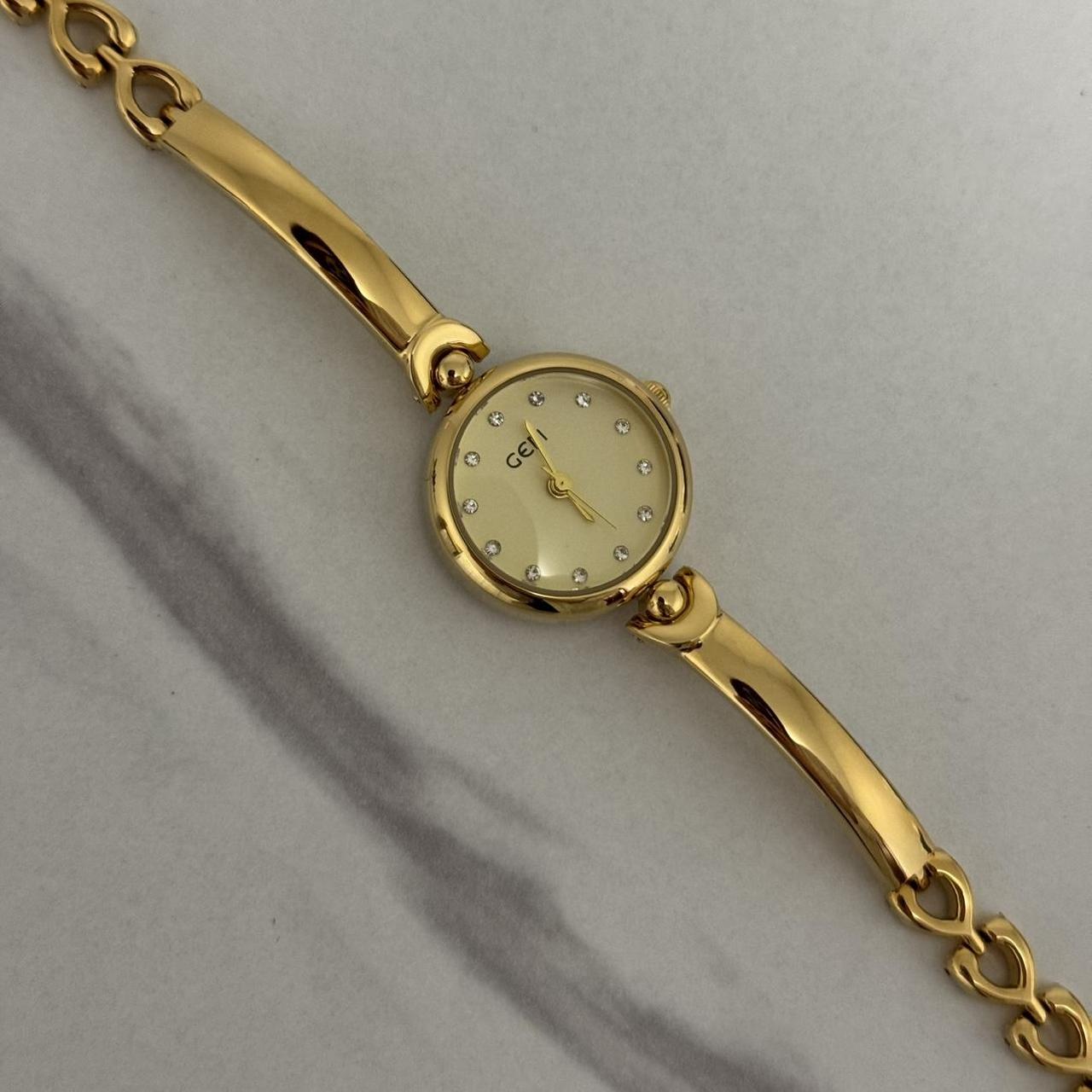 Round Gold Watch