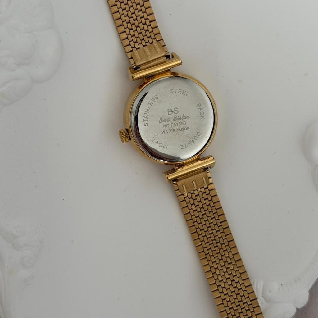 Gold watch moon
