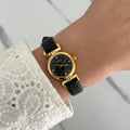 Women's Black and Gold Watch