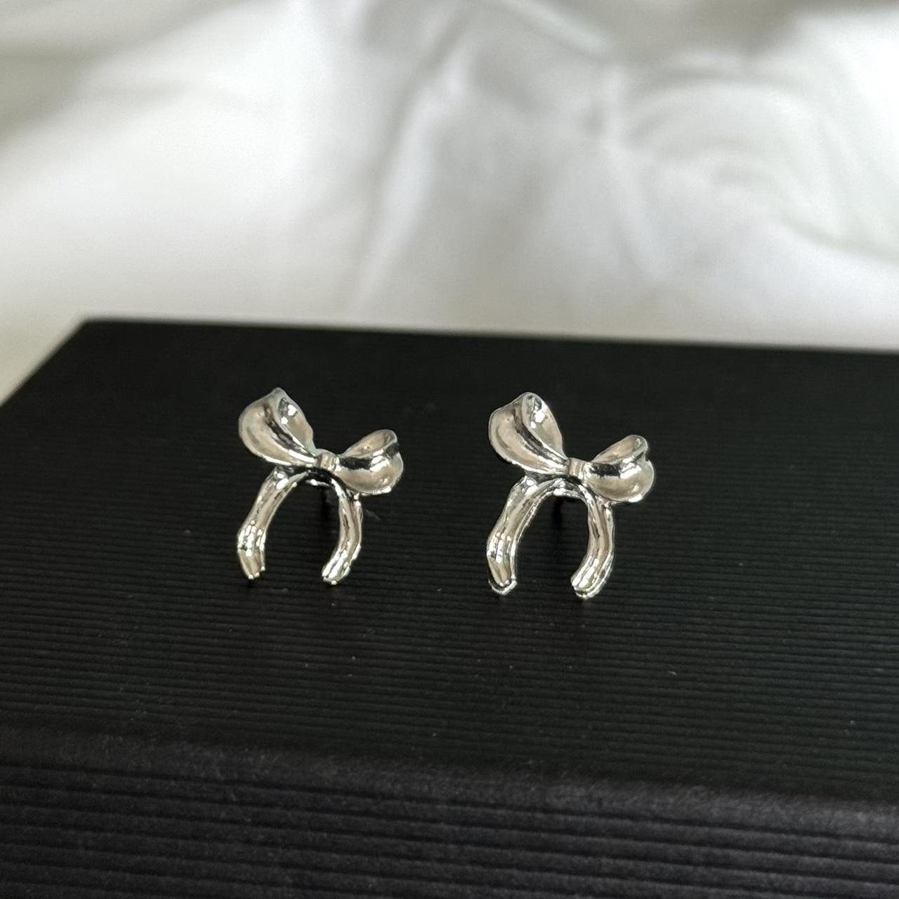 Earrings With Silver Bow