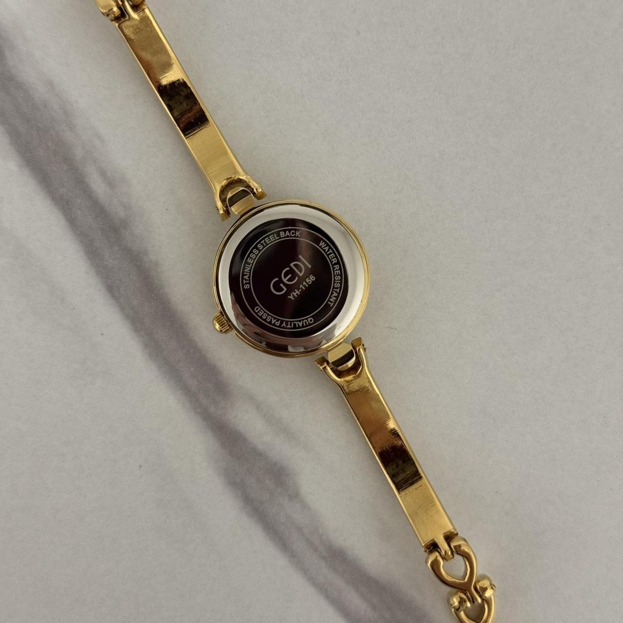 Round Gold Watch