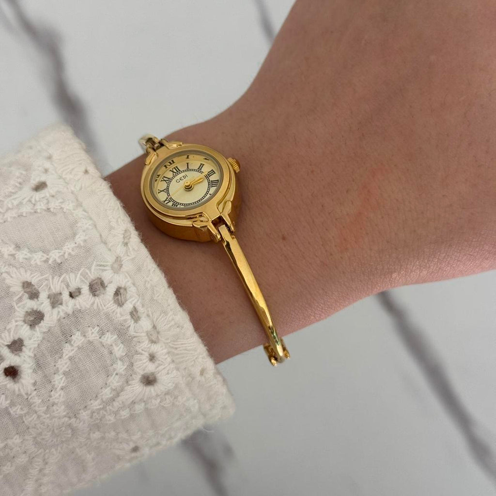 Tiny Gold Watch