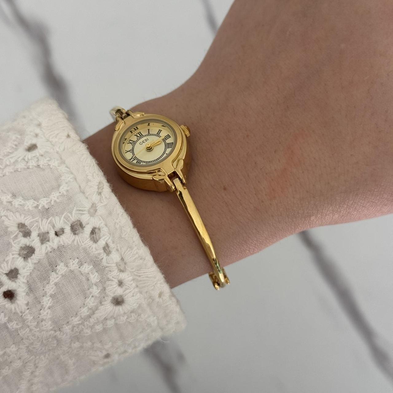 Tiny Gold Watch