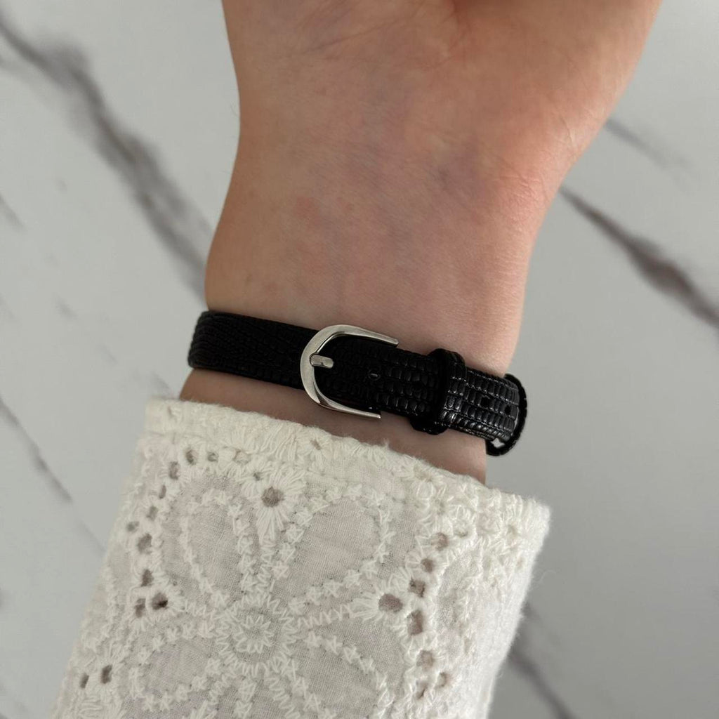 Women's Black and Gold Watch