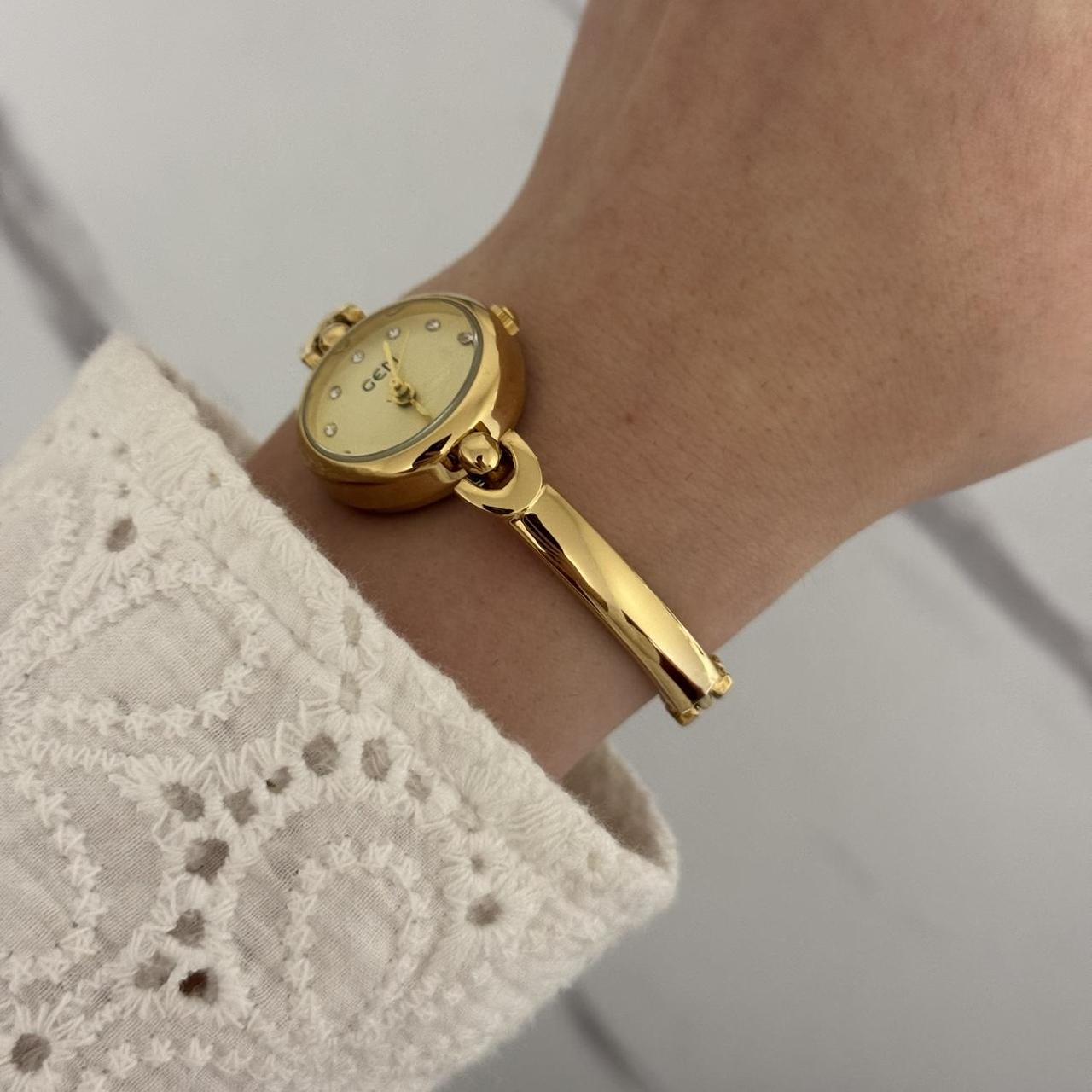 Round Gold Watch