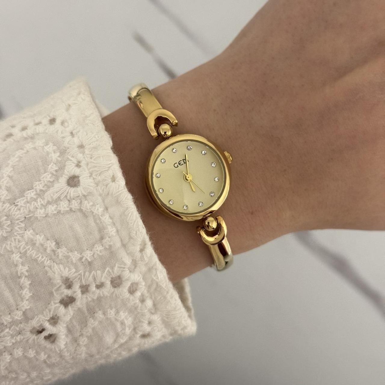 Round Gold Watch