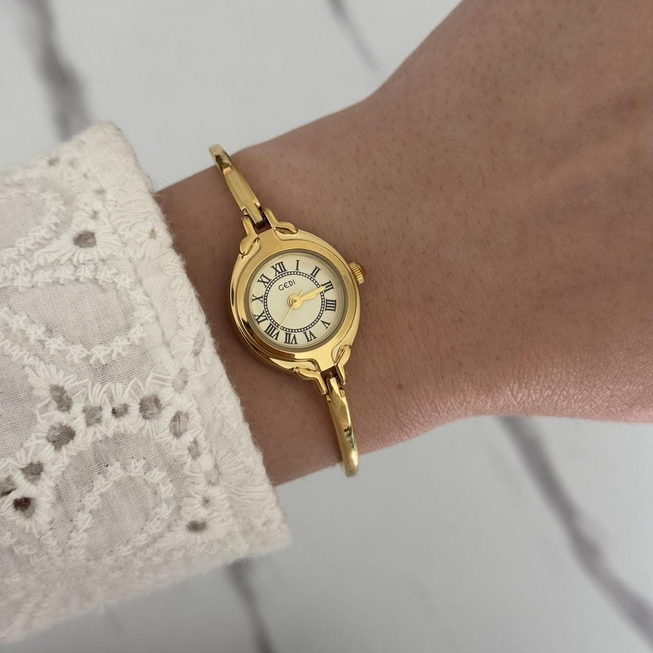 Tiny Gold Watch